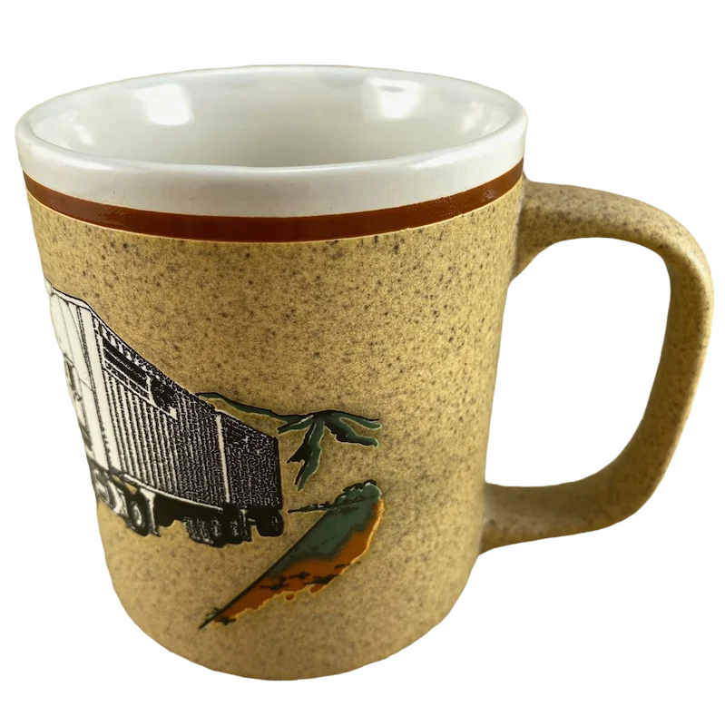 best coffee mugs for cold tea-Consolidated Freight Truck Mountains Background Color Etched Mug